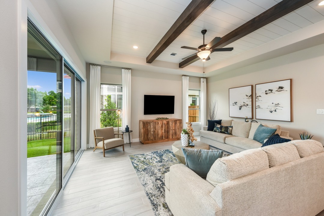 We can't get over this stunning and spacious living room from @chesmarhomes 🤩Perfect for a family movie night or a game night with neighbors, this common room is complete with a wall of windows and access to the outdoor covered patio. Join their VIP list to stay up to date at chesmar.com/communities/silo-mills/ #SiloMills #SiloMillsLiving #SiloMillsTX #GodleyTexas #GodleyTX #NewHomesGodleyTX #GodleyRealEstate #GodleyISD #NewHomes